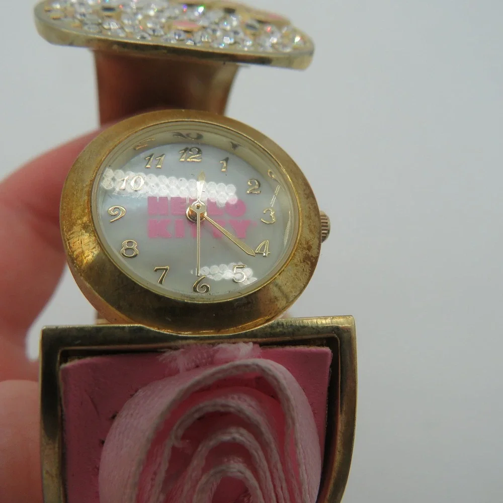 Sanrio Hello Kitty Rhinestone Flip Top Bangle Watch Pink Rosette Gold Tone Y2K